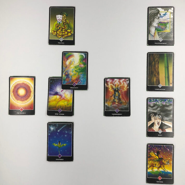 Celtic Cross Layout of daily cards.1 is Now, card is New Vision.2 is Influence, card is Creativity.3 is Goal, card is Politics.4 is Distant Past, card is Thunderbolt.5 is Recent Past, card is Existence.6 is Future Energy, card is The Source.7 is Feelings, card is Success.8 is Others’ views, card is Guilt.9 is Hopes & Fears, card is Comparison.10 is Outcome, card is Postponement.