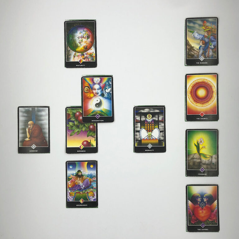 Celtic Cross Layout of daily cards.1 is Now, card is Ripeness. 2 is Influence, card is Integration. 3 is Goal, card is Maturity. 4 is Distant Past, card is Morality. 5 is Recent Past, card is Abundance. 6 is Future Energy, card is Sorrow. 7 is Feelings, card is The Lovers. 8 is Others’ views, card is Courage. 9 is Hopes & Fears, card is The Source. 10 is Outcome, card is The Burden.